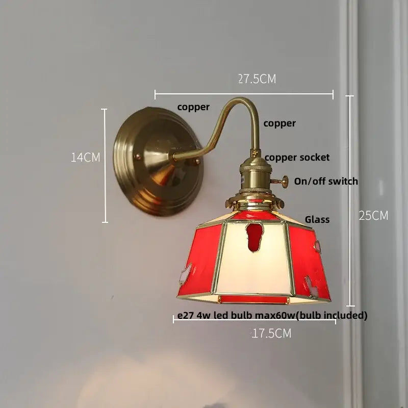 Red and cream stained glass lamp with copper finish showcased alongside vintage green glass led wall sconce brass star stair light