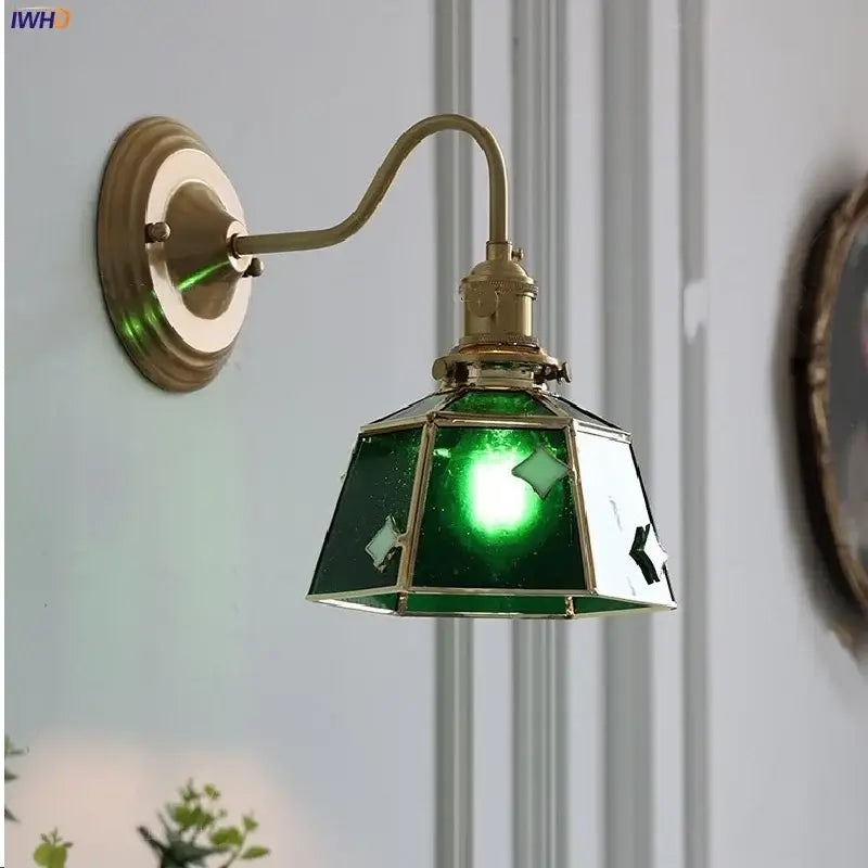 Vintage green glass led wall sconce with brass star accents and star-shaped cutouts for stair lighting