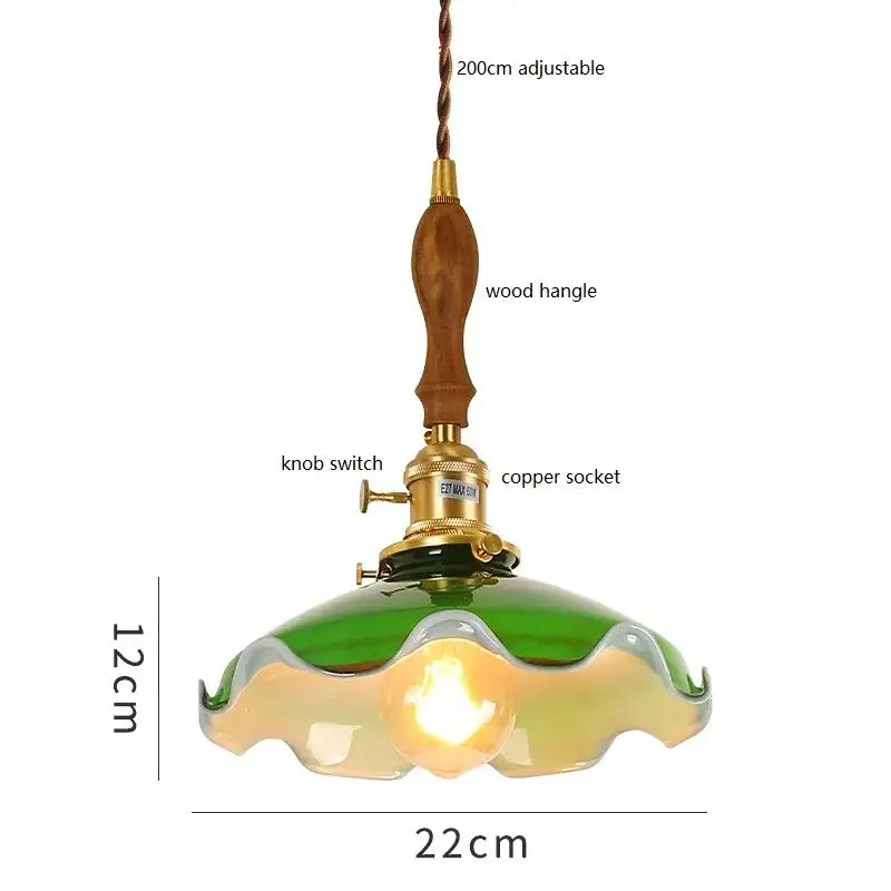 Vintage green glass pendant lamp with cream glass and wooden handle featuring brass hardware for kitchen lighting