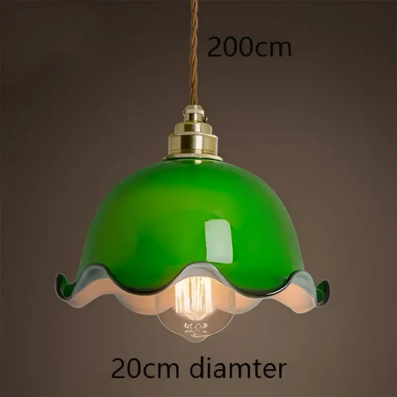 Vintage green glass pendant lamp with scalloped edge and brass hardware ideal as an edison vintage pendant lamp