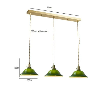 Set of three vintage pendant lamp green glass shades with brass hardware and adjustable chains for kitchen lighting