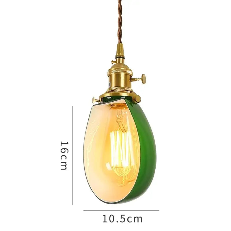 Vintage pendant lamp with brass hardware and green glass shade featuring an exposed filament Edison vintage pendant bulb