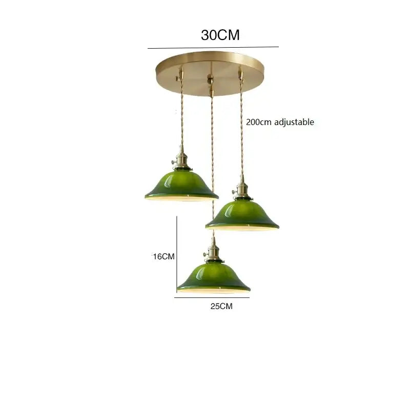 Vintage green glass pendant lamp with brass hardware and adjustable chains, ideal as an edison vintage pendant lamp