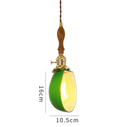 Vintage pendant lamp with green glass shade brass hardware and wooden handle ideal for kitchen lighting