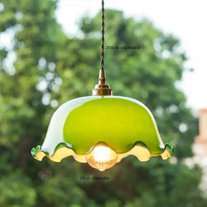 Vintage green glass pendant lamp with scalloped edge and brass hardware ideal as an edison vintage pendant