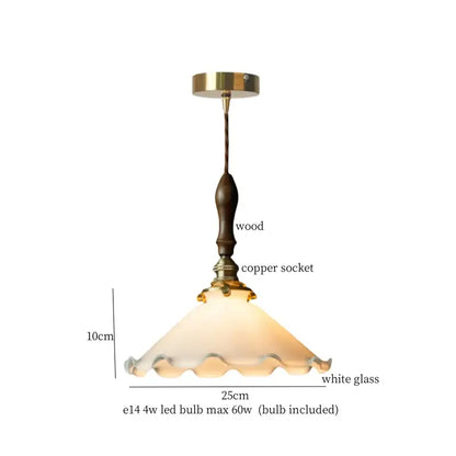Vintage green lotus led pendant light with dark wood stem brass accents and white scalloped glass shade for dining room