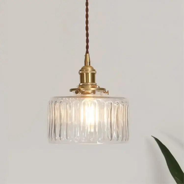 Vintage green ribbed glass led pendant lamp with vertical ridges brass hardware and braided brown cord for dining room