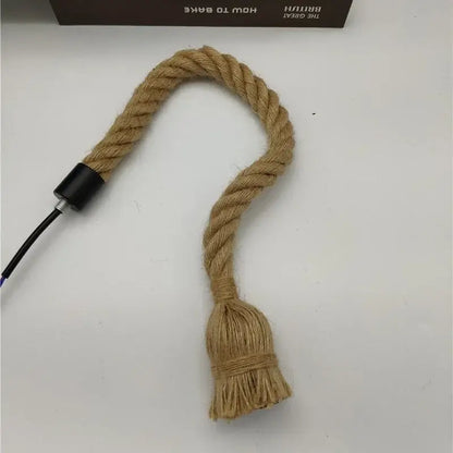 Natural fiber vintage hemp rope pendant light cord with black connector and frayed tassel for focused lighting