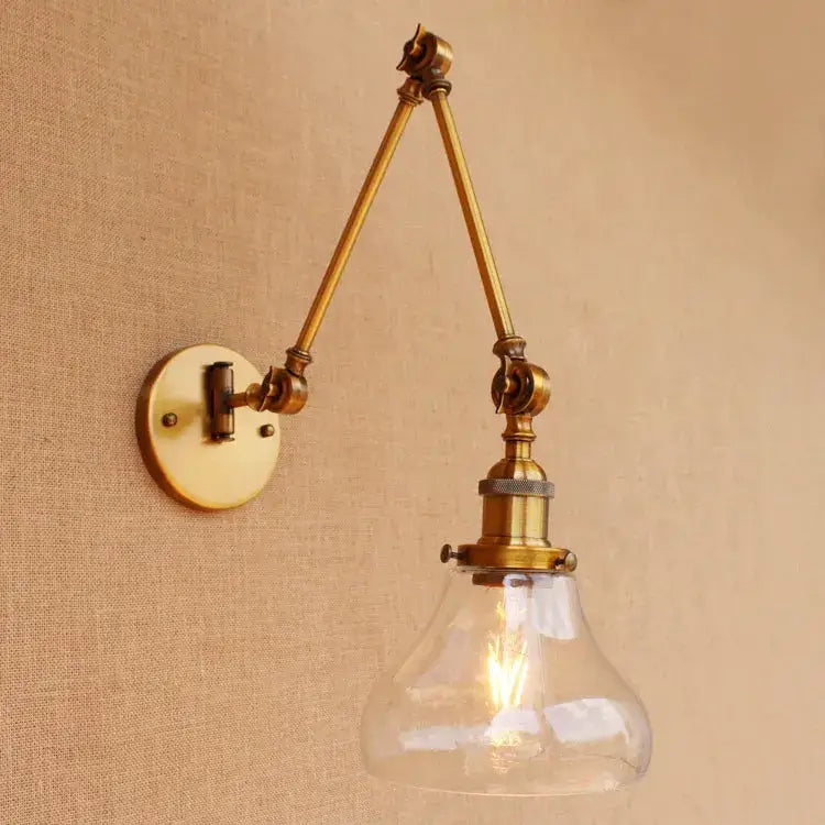 Vintage industrial brass glass ball swing arm bedroom sconce with adjustable clear glass bell-shaped shade