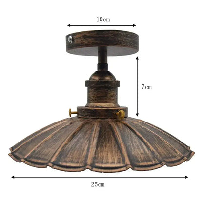 Vintage industrial flush mount light with antique bronze finish, fluted scalloped shade, and wooden base for kitchen decorbites industrial flush