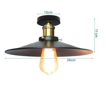 Vintage industrial flush mount light in black metal with brass fixture and exposed edison bulb for kitchen decorbites industrial flush