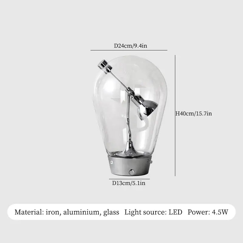 A sleek decorbites glass desk lamp with transparent glass shade and metallic iron aluminum base for vintage industrial decor