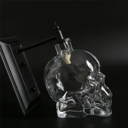 Vintage industrial clear glass skull wall sconce with black metal spout and cork stopper for living room lamp