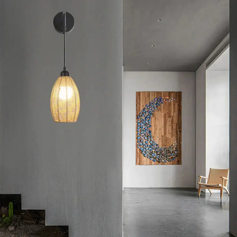 Warm-toned woven wicker pendant wall lamp with black metal fixture featuring decorbites industrial hemp rope design