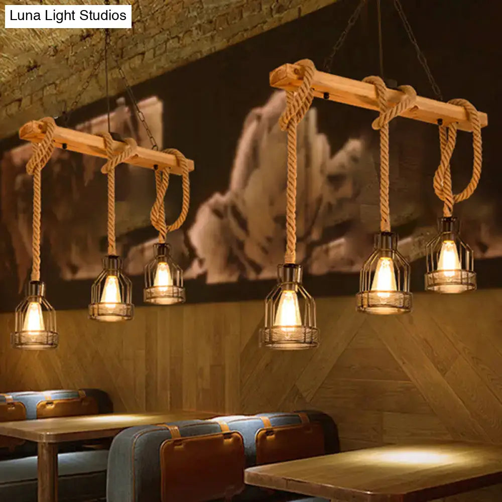 Decorbites vintage style island lighting fixture with rustic wooden beam black metal cages and braided rope suspension