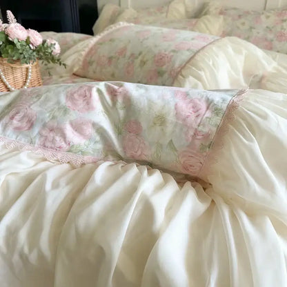 Cream-colored bedding set pillow with delicate pink rose floral print and decorbites french lace ruffles trim