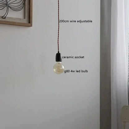 Vintage japanese ceramic led pendant light with clear glass g80 bulb and black ceramic socket by decorbites ceramic led