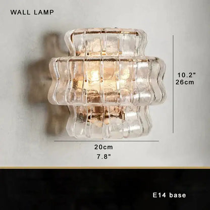 Clear ribbed glass wall lamp with stacked wave design and gold metal base for decorbites brown glass chandelier decor