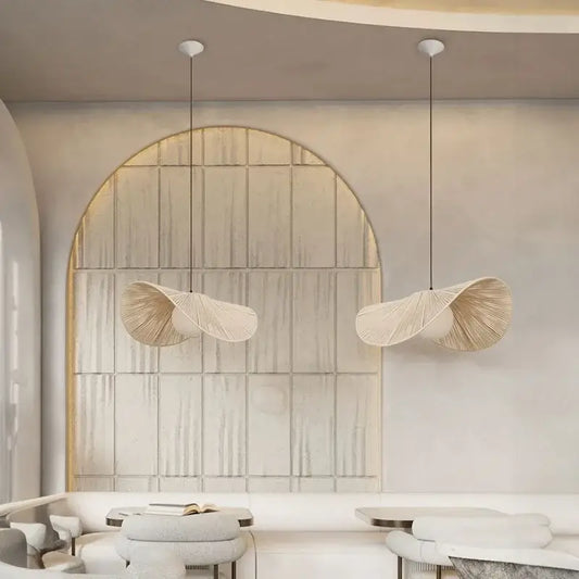 Two elegant off-white pendant lights with a woven leaf design made of decorbites cotton rope for bedroom decor