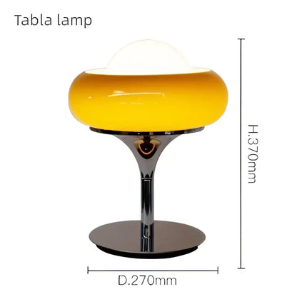 Vintage table lamp with yellow translucent glass shade and chrome stem and base for bedroom lighting