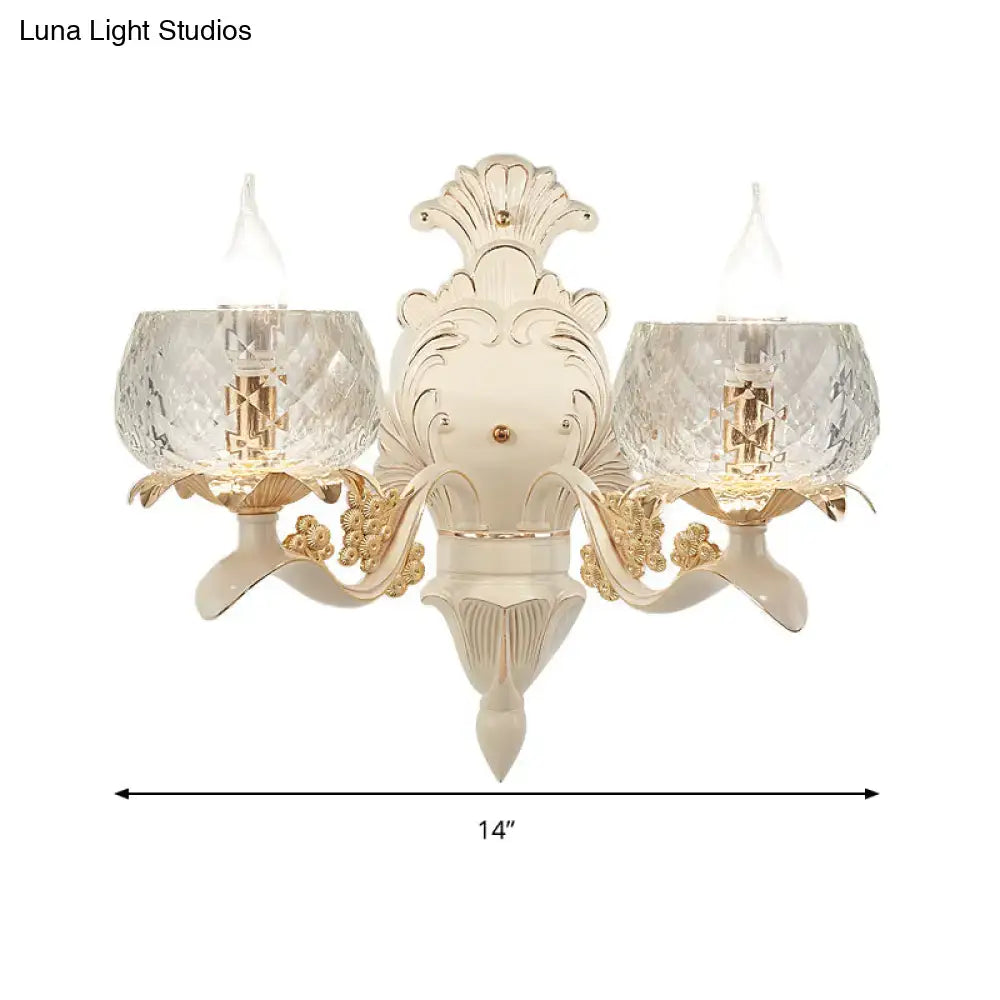 Elegant cream and gold vintage ornate wall light sconce with crystal glass shades for bedroom lighting