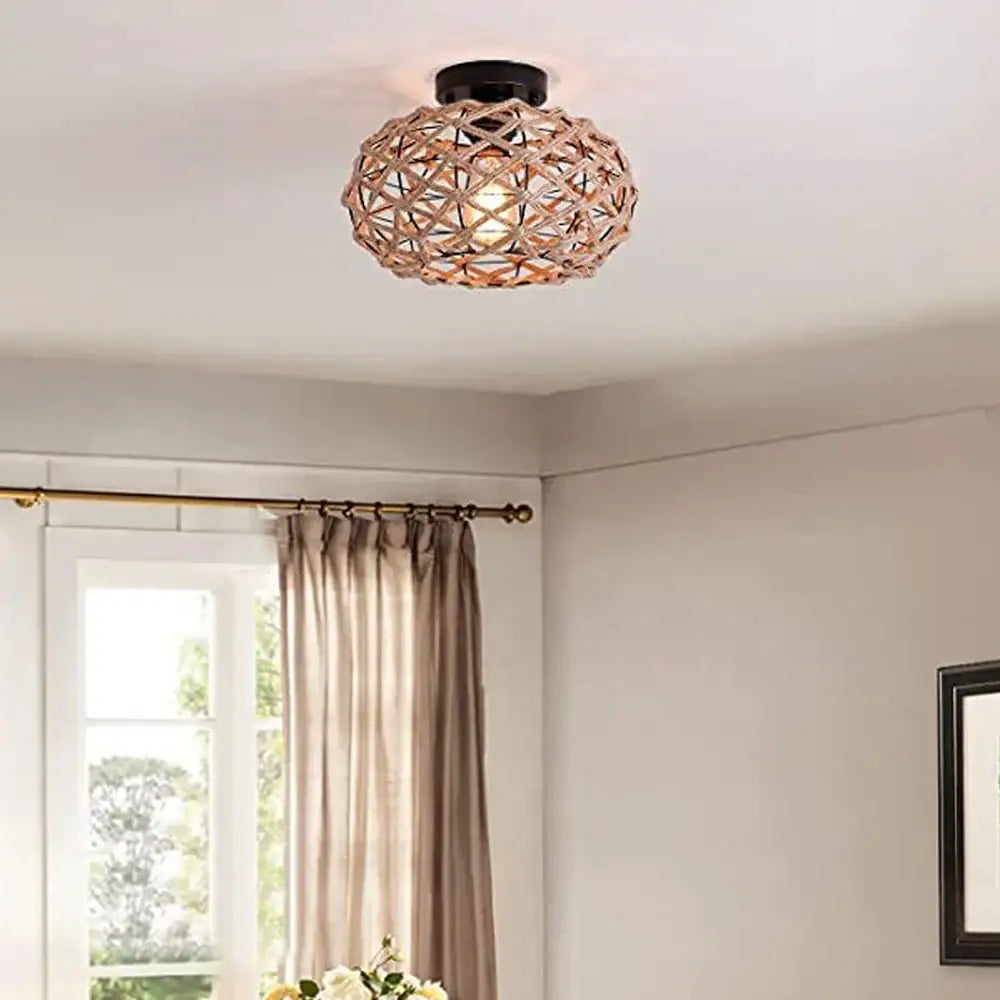 Vintage rattan woven ceiling light with black metal base featuring handmade hemp rope for dining room decorbites decor