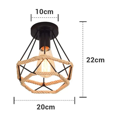Vintage rattan dining room chandelier with industrial black metal frame and handmade hemp rope ceiling accents by decorbites handmade hemp