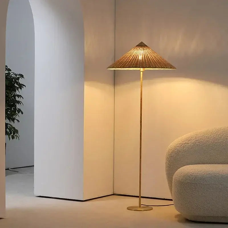 Vintage floor lamp with golden stand and decorbites gubi rattan shade featuring woven bamboo for living room decor