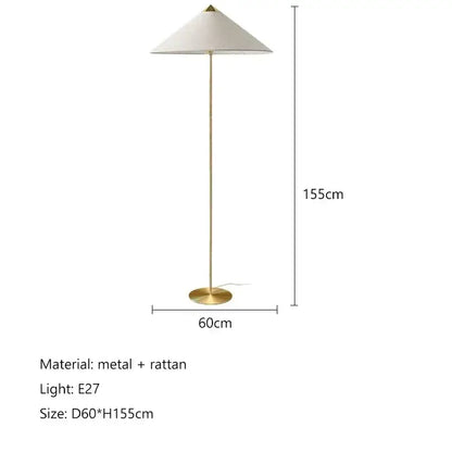 Vintage floor lamp with gold-toned metal frame and gubi rattan shade for elegant living room decorbites lighting