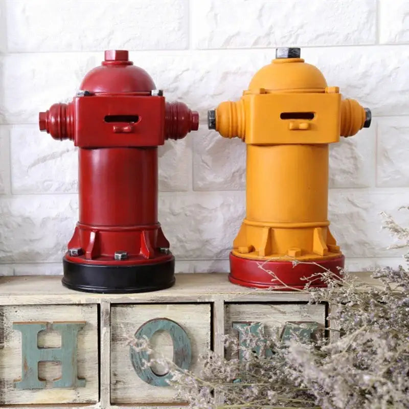 Vintage red and yellow hydrant piggy bank with painted metal finish for living room decor and coin storage