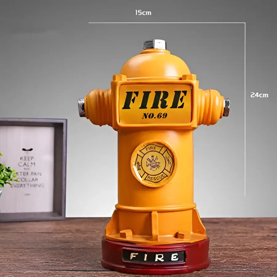 Vintage red and yellow hydrant piggy bank with black fire lettering and metallic accents for living room decor