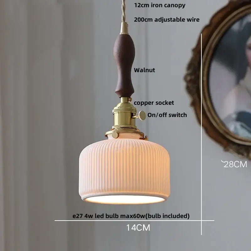 A warm-toned ribbed ceramic led pendant light with walnut wood handle and brass hardware for kitchen decorbites pendant lights