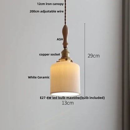 A warm-toned white ceramic led pendant light with vertical ridges, brass copper socket, and ash wood canopy decorbites ceramic led