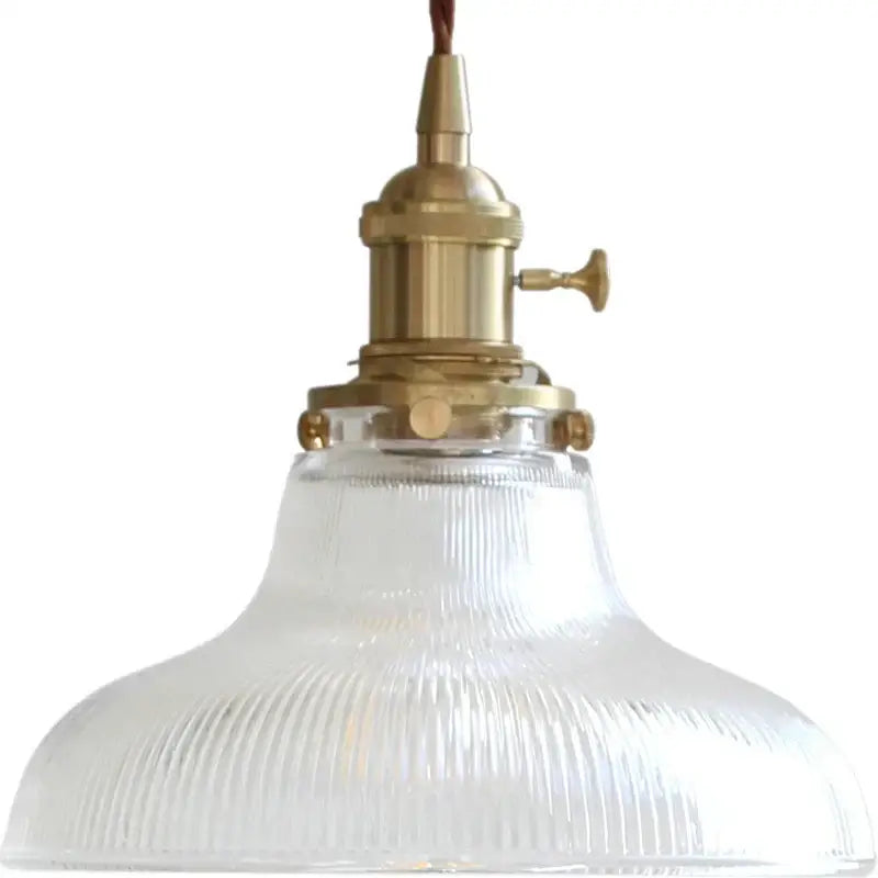Vintage ribbed glass copper pendant light featuring a brass finish and clear glass shade for kitchen or dining room