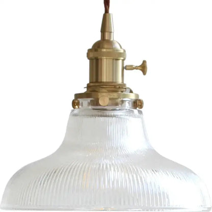 Vintage ribbed glass copper pendant light featuring a brass finish and clear glass shade for kitchen or dining room