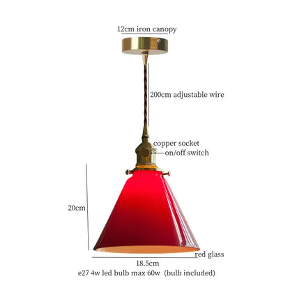 Red glass pendant lamp with brass iron canopy and copper socket complementing decorbites cream glass copper fixture
