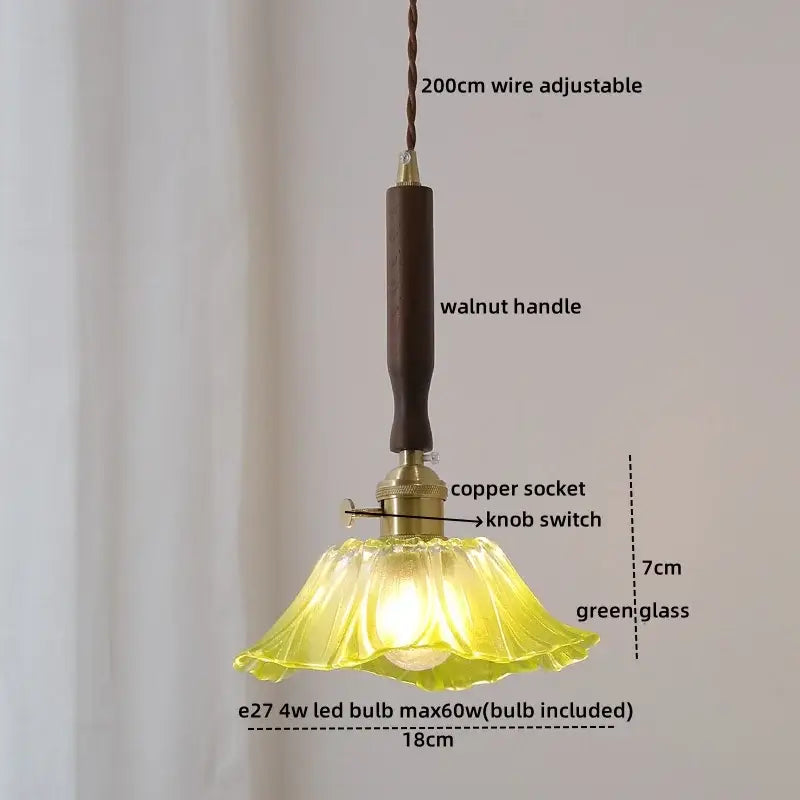 A delicate green scalloped glass pendant light with a dark walnut handle from decorbites copper walnut led collection