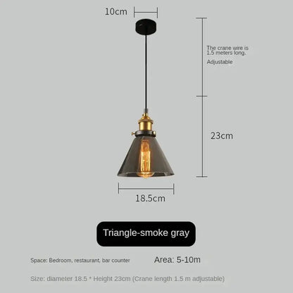 Industrial-style pendant light with triangular smoke gray glass shade and brass hardware for dining decorbites amber glass vintage