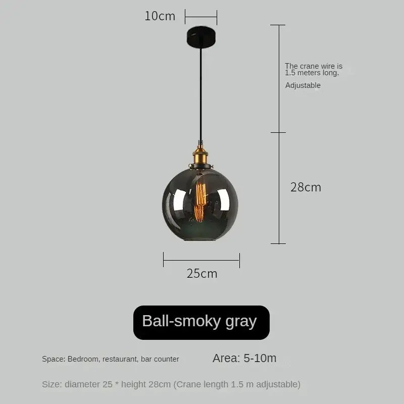 A vintage smoked amber glass pendant light with smoky gray globe and brass hardware ideal for dining room decorbites amber glass