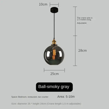 A vintage smoked amber glass pendant light with smoky gray globe and brass hardware ideal for dining room decorbites amber glass