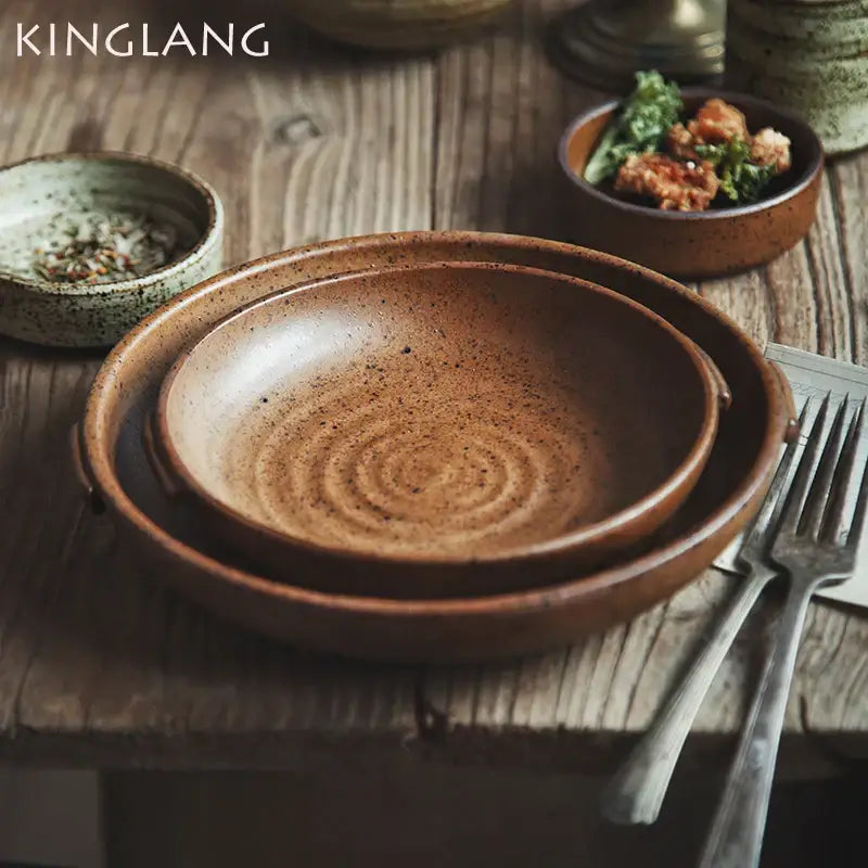 Earthy brown decorbites ceramic round swallow plate with speckled glaze and concentric ridges for dining room use