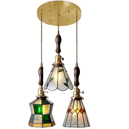 Three-piece vintage stained glass copper pendant light with green amber clear shades and wood knob switch for kitchen