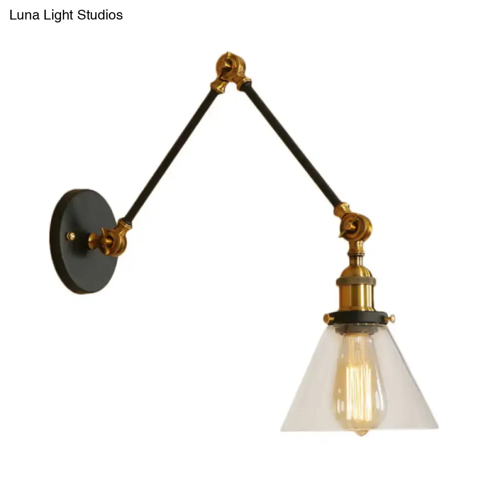 Decorbites vintage style wall sconce with satin brass hardware, black articulated arms, and clear glass shade with filament bulb