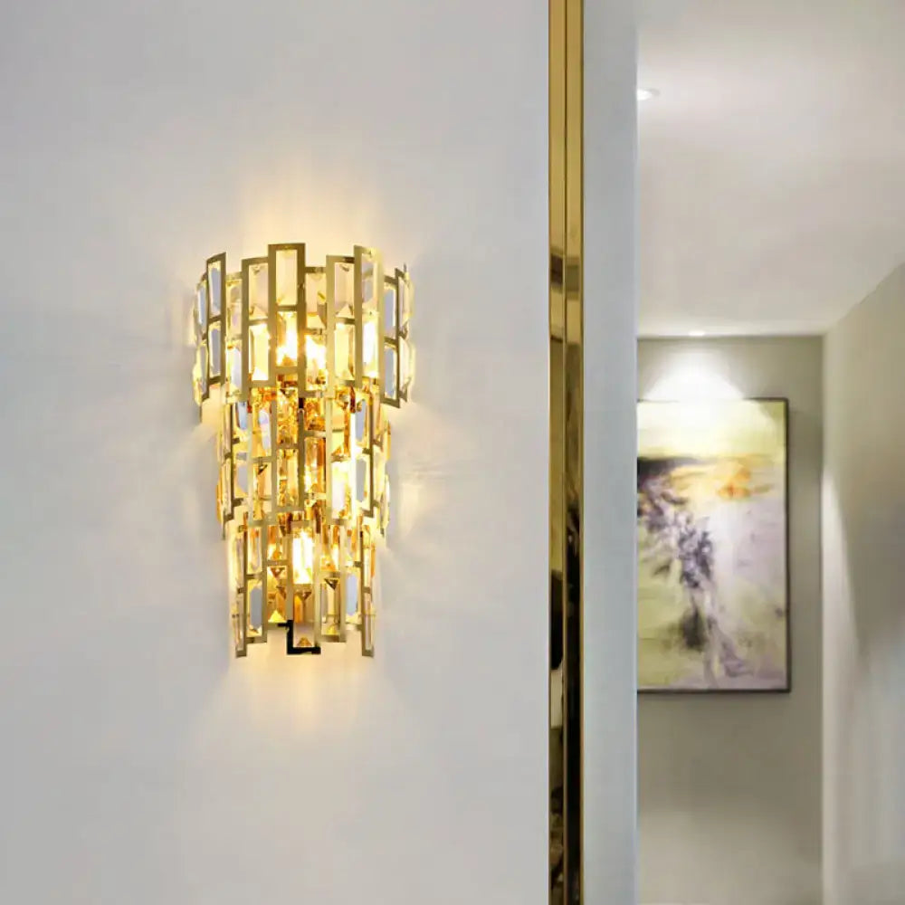 Vintage style gold tiered wall sconce with cascading rectangular crystal panels for living room lighting