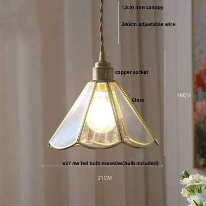 Vintage teal blue glass led pendant light with antique brass finish and scalloped decorbites blue glass design