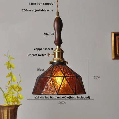 A warm amber stained glass pendant light with walnut handle and brass accents for vintage decorbites blue glass settings