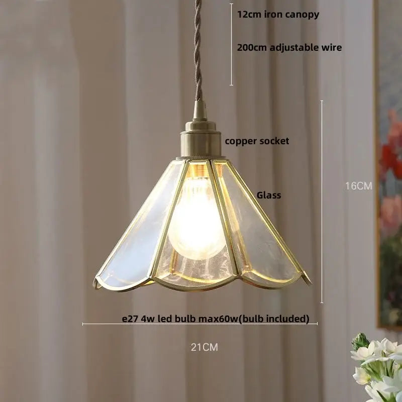 Vintage teal blue glass led pendant light with antique brass finish and scalloped panels featuring an adjustable copper socket