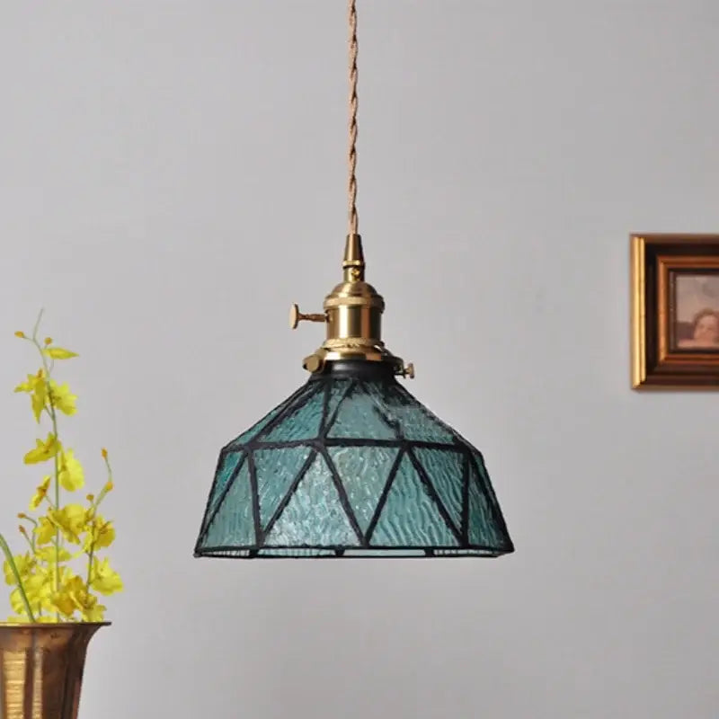 Vintage teal blue glass led pendant light with geometric pattern, brass fixture, and twisted cord for kitchen decorbites blue glass