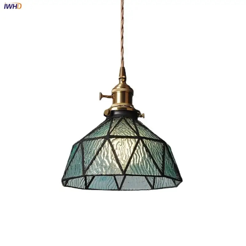 Vintage teal blue glass led pendant light with textured shade, black geometric lines, and brass-finished hardware for kitchen decorbites blue glass lighting