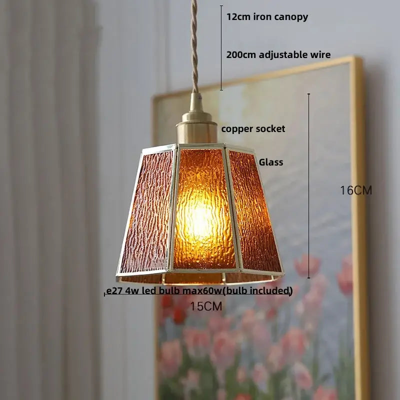 Vintage teal blue glass led pendant light featuring a warm amber textured glass shade with brass and copper accents